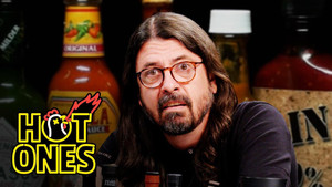 Dave Grohl Makes a New Friend While Eating Spicy Wings