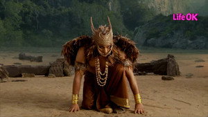 Sati is drawn to the damaru