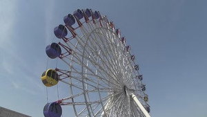 Thoughts and Reflections on a Rooftop Ferris Wheel
